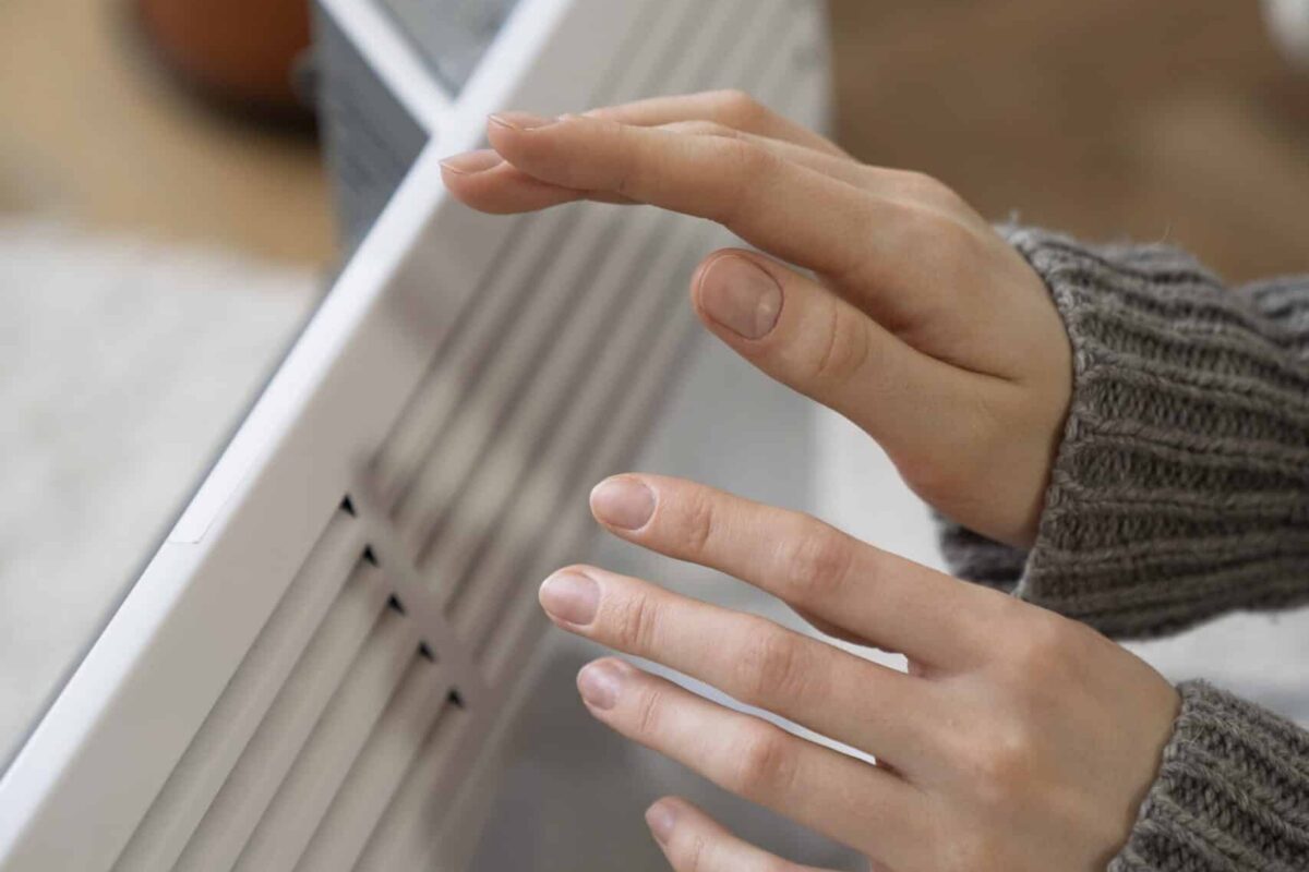 close up person near heater