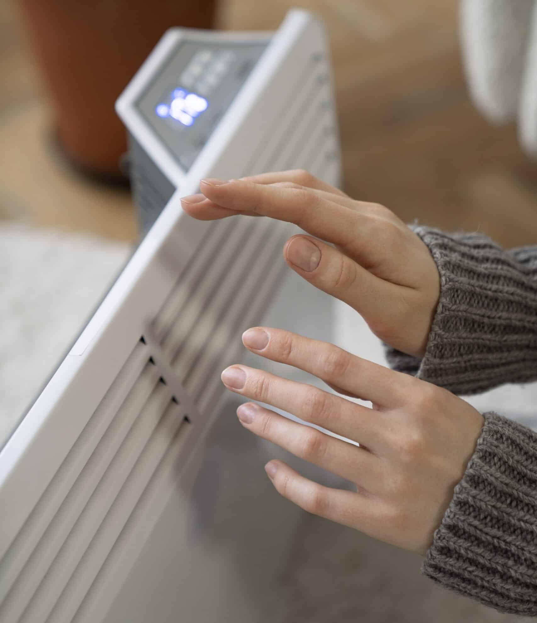 close up person near heater